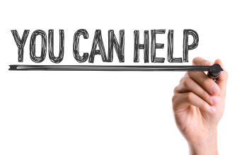 Hand with marker writing the word You Can Help